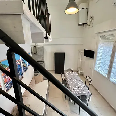 8 Lofts - - 1 Apartment *